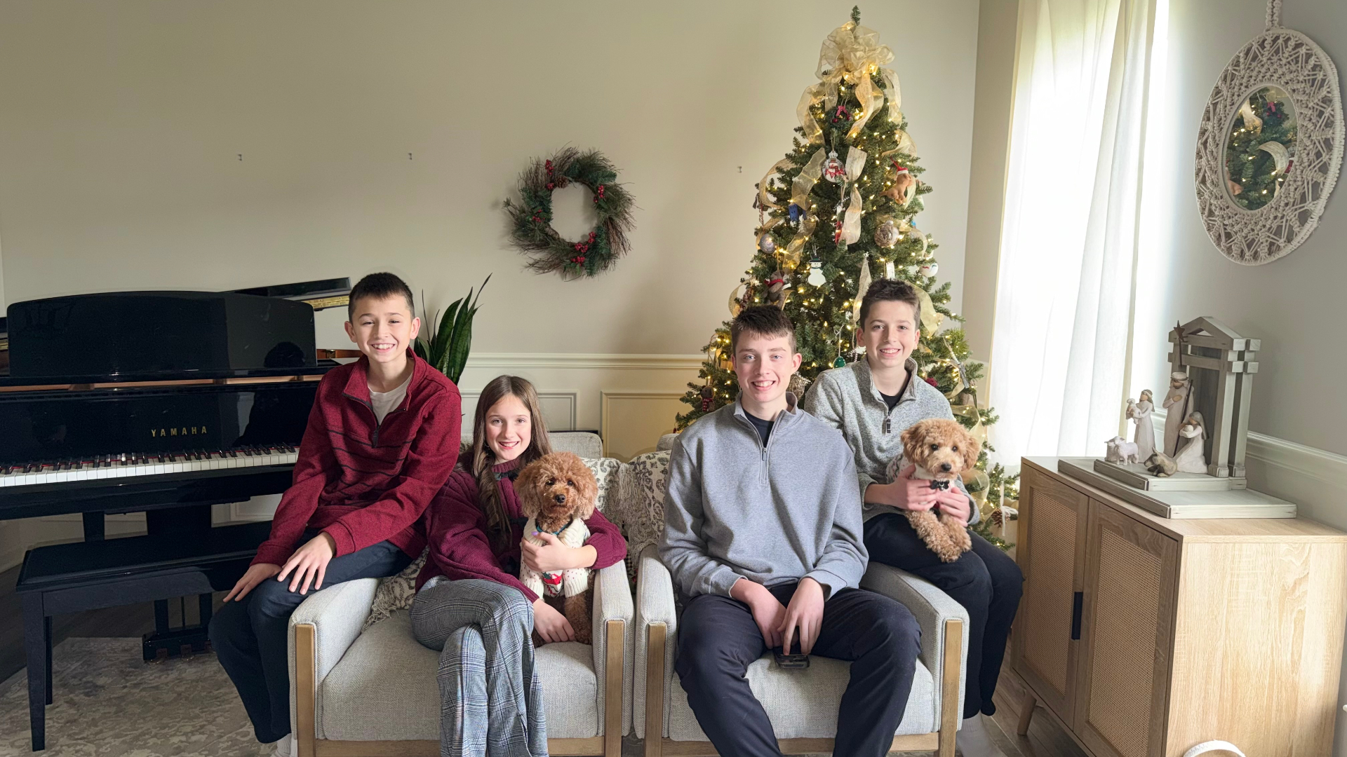 The M&M Doodle Pups family with their two doodles at home